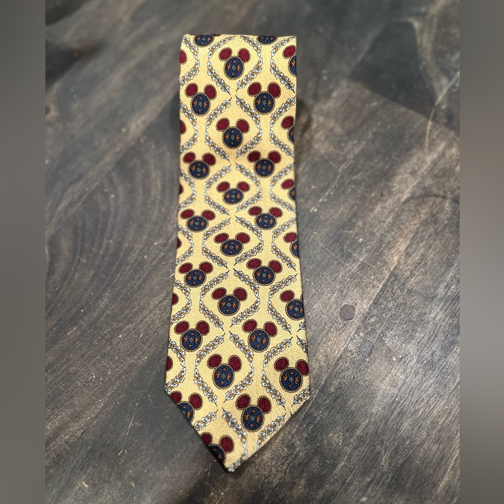 The Disney store men’s necktie with subtle and classic Mickey ears.